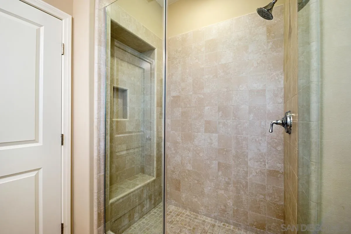 82 Brindisi Irvine, CA 92618 - Photo 25 of 49 a bathroom with a shower