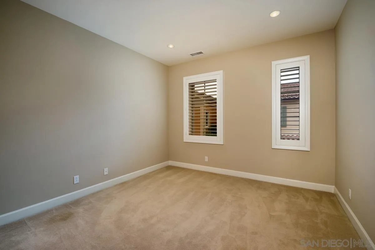 82 Brindisi Irvine, CA 92618 - Photo 27 of 49 an empty room with a window