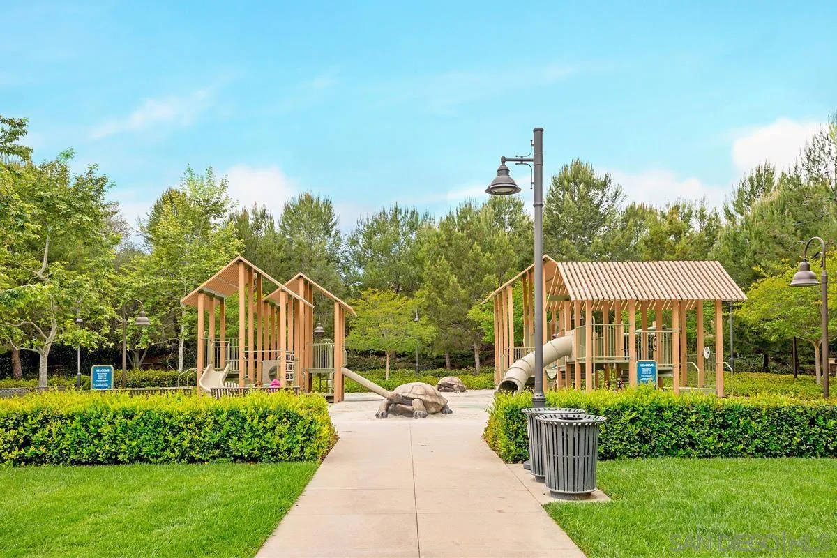 82 Brindisi Irvine, CA 92618 - Photo 39 of 49 a front view of a house with a yard