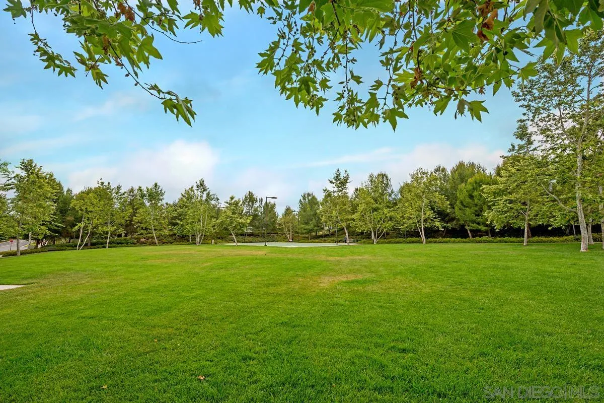 82 Brindisi Irvine, CA 92618 - Photo 40 of 49 a view of a grassy field with trees