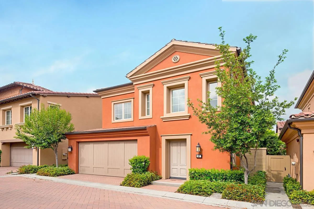82 Brindisi Irvine, CA 92618 - Photo 4 of 49 front view of a house with a yard and potted plants