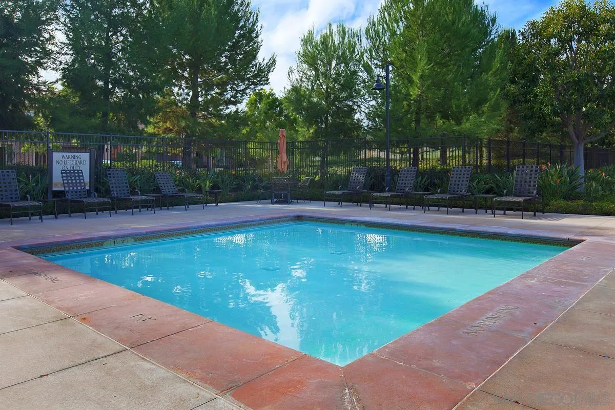 82 Brindisi Irvine, CA 92618 - Photo 45 of 49 a swimming pool with outdoor seating and yard