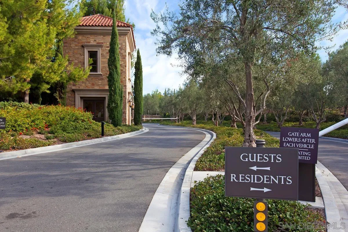 82 Brindisi Irvine, CA 92618 - Photo 49 of 49 a sign on the side of a building