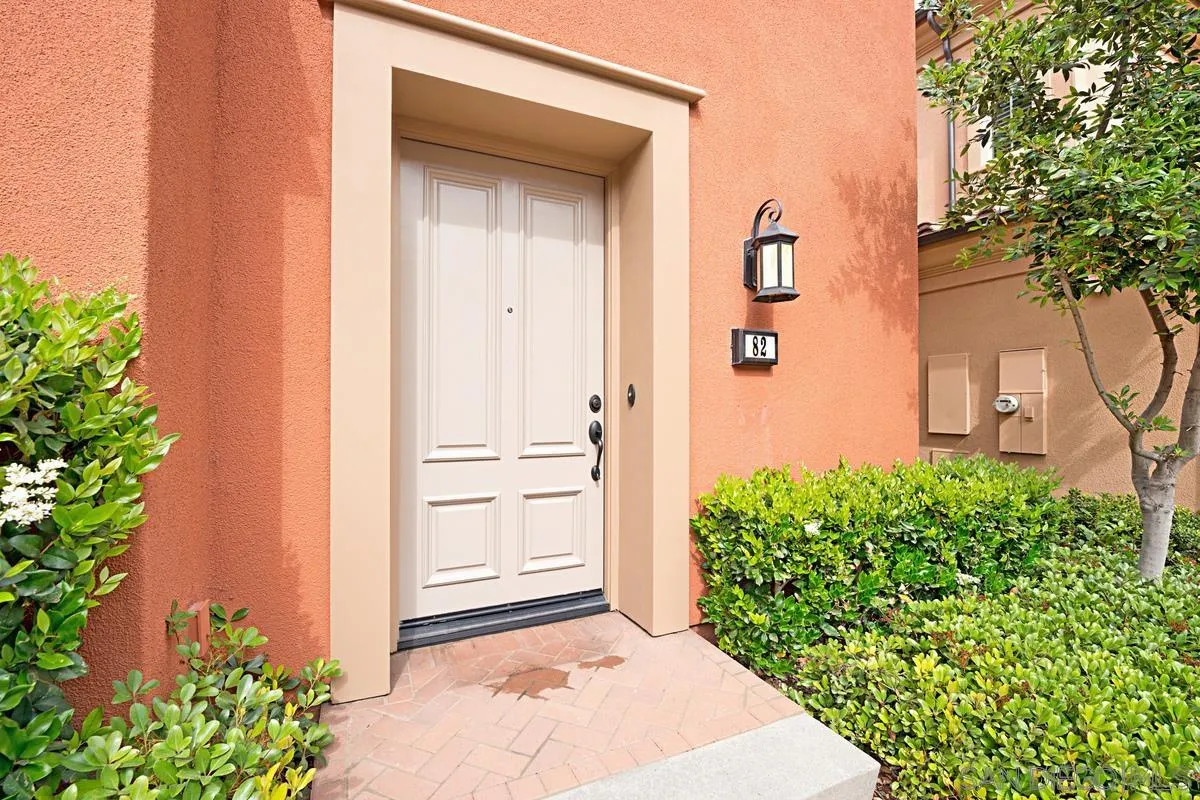 82 Brindisi Irvine, CA 92618 - Photo 5 of 49 front view of a house with a yard