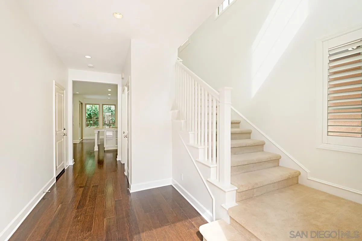 82 Brindisi Irvine, CA 92618 - Photo 6 of 49 a view of entryway and hall with wooden floor