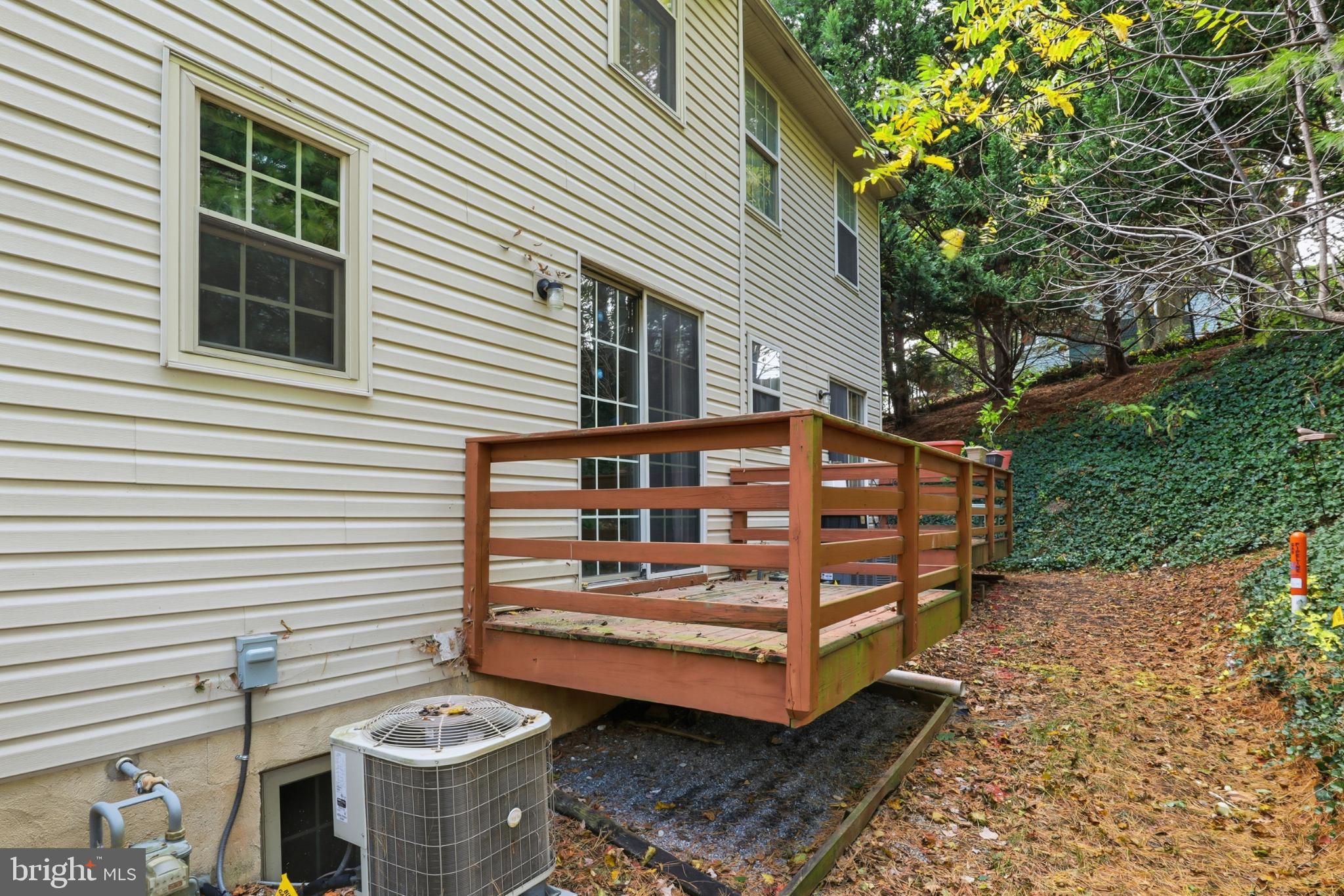 357 Country Club Road, Unit 26 Red Lion, PA 17356 - Photo 25 of 30 Charming backyard deck nestled in nature.