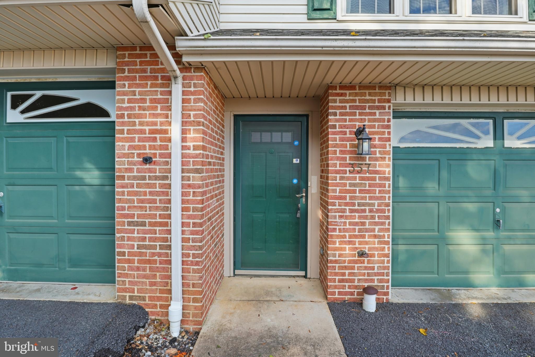 357 Country Club Road, Unit 26 Red Lion, PA 17356 - Photo 4 of 30 Charming entryway with classic brick facade.