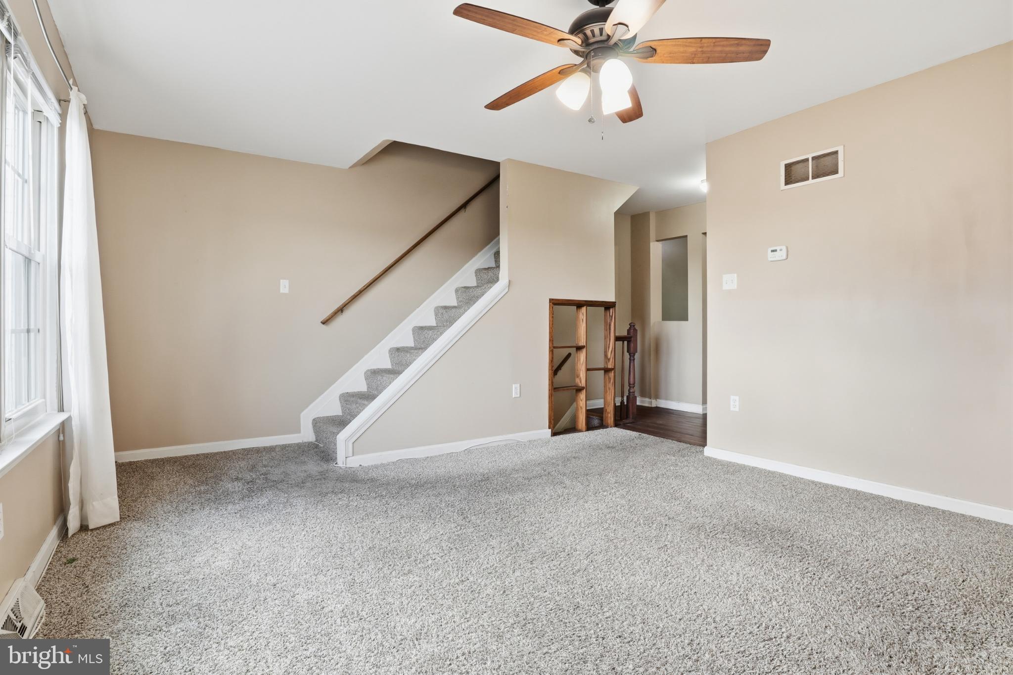 357 Country Club Road, Unit 26 Red Lion, PA 17356 - Photo 6 of 30 Spacious living area with inviting staircase.