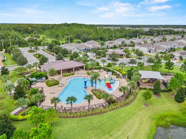 an aerial view of a house with a garden