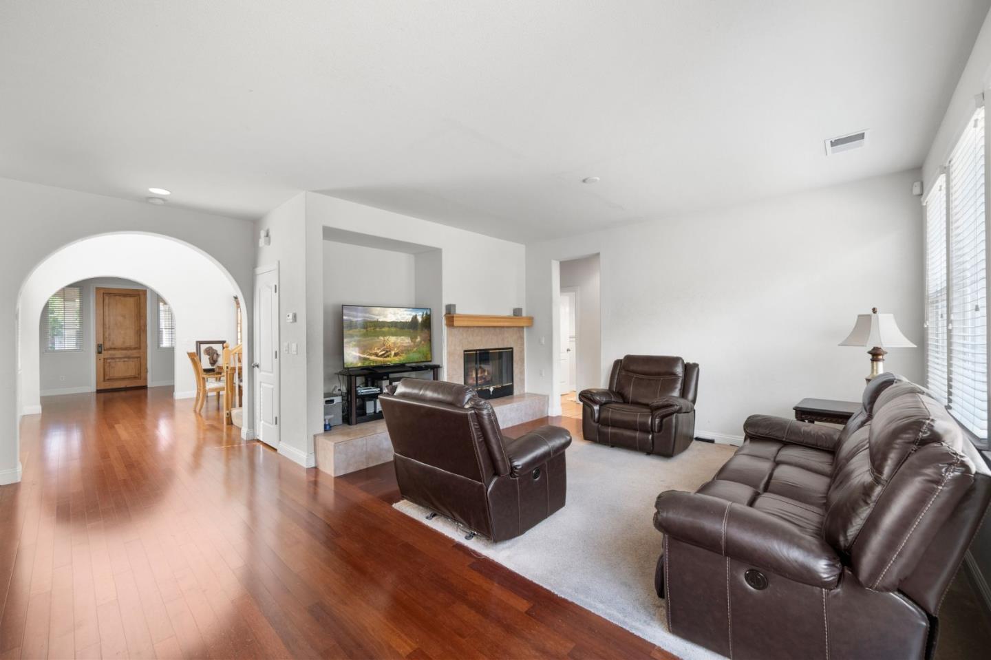 318 Rothbury Way San Ramon, CA 94582 - Photo 22 of 53 a living room with furniture and a fireplace