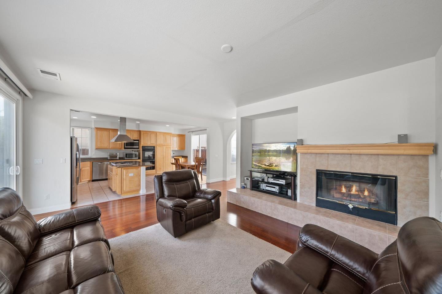 318 Rothbury Way San Ramon, CA 94582 - Photo 23 of 53 a living room with furniture and a fireplace