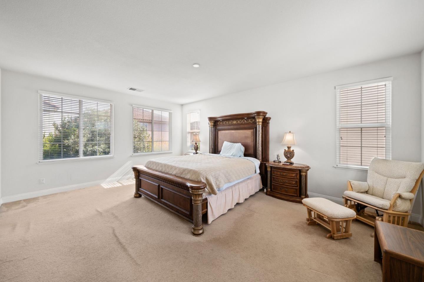 318 Rothbury Way San Ramon, CA 94582 - Photo 31 of 53 a spacious bedroom with a bed and glass window