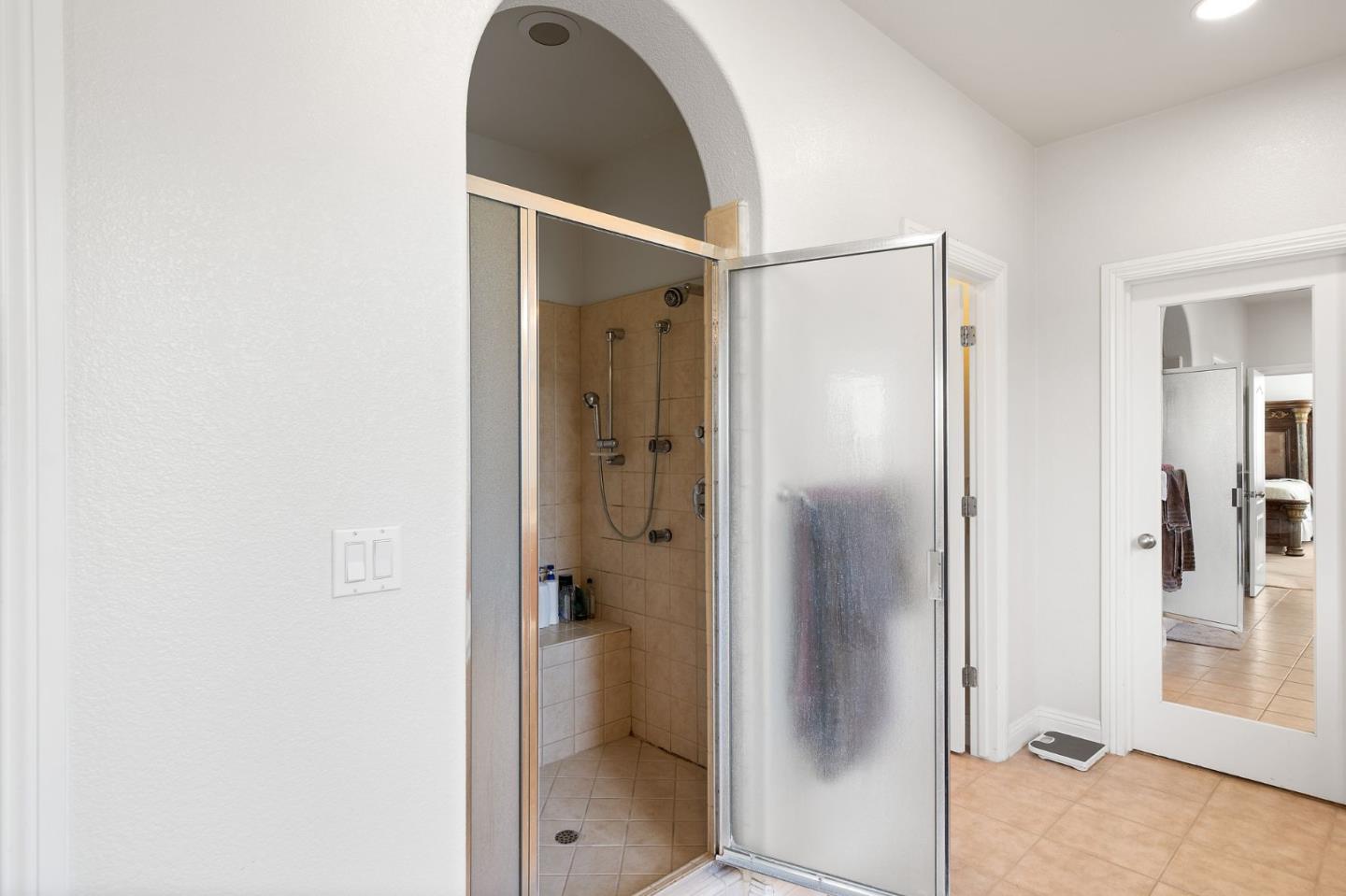 318 Rothbury Way San Ramon, CA 94582 - Photo 37 of 53 a bathroom with a glass shower door and a sink