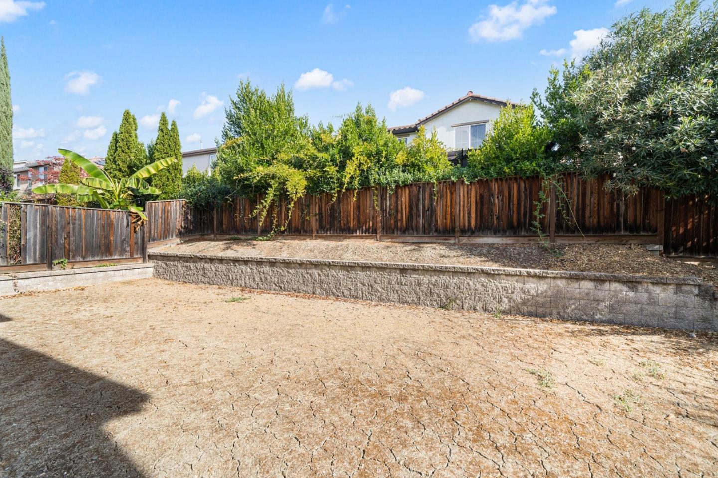 318 Rothbury Way San Ramon, CA 94582 - Photo 43 of 53 a view of backyard with potted plants and wooden fence