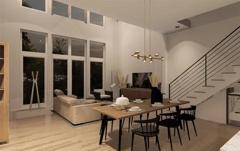 a view of a livingroom with furniture and window