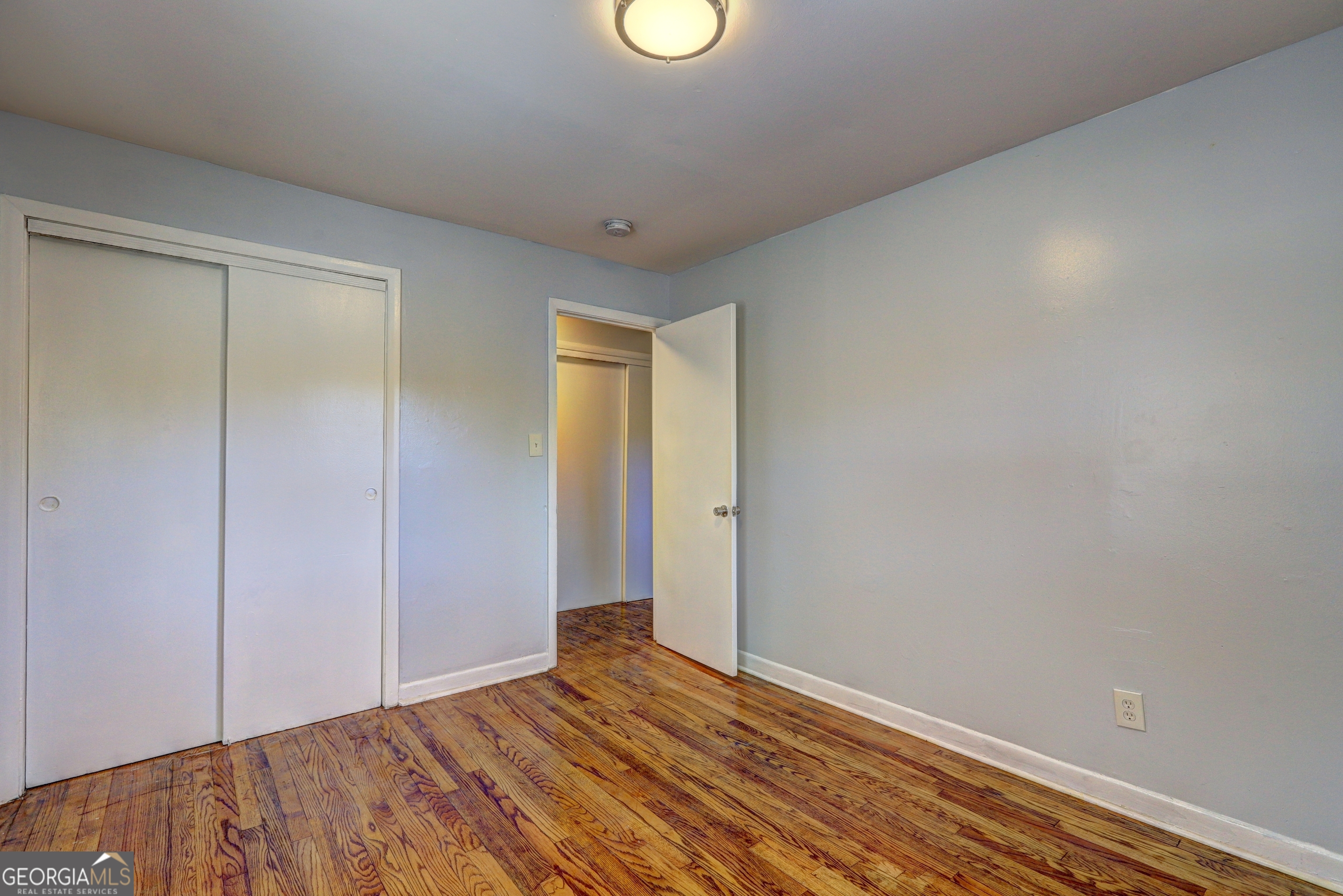 2270 Cresta Drive Decatur, GA 30032 - Photo 17 of 26 a view of empty room with wooden floor