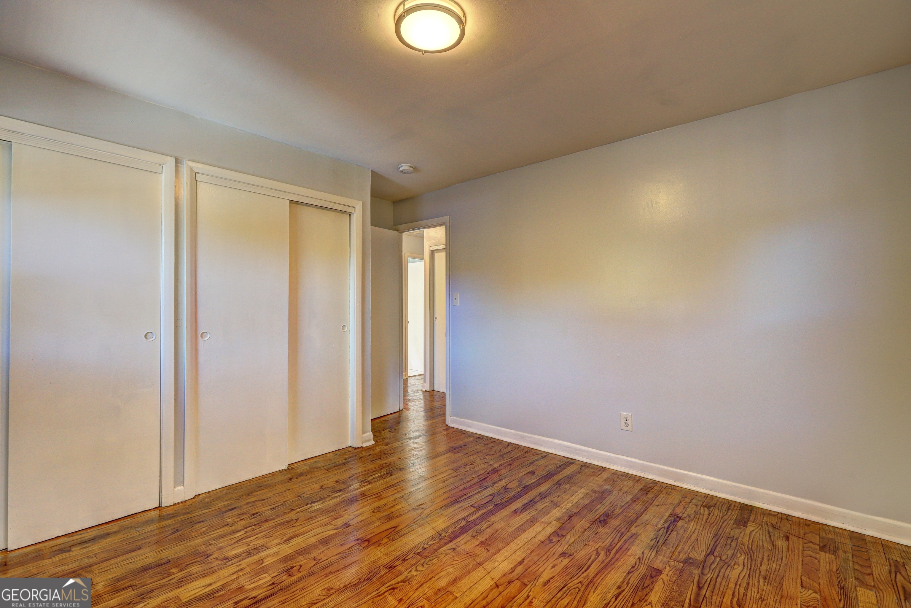 2270 Cresta Drive Decatur, GA 30032 - Photo 19 of 26 a view of an empty room and wooden floor