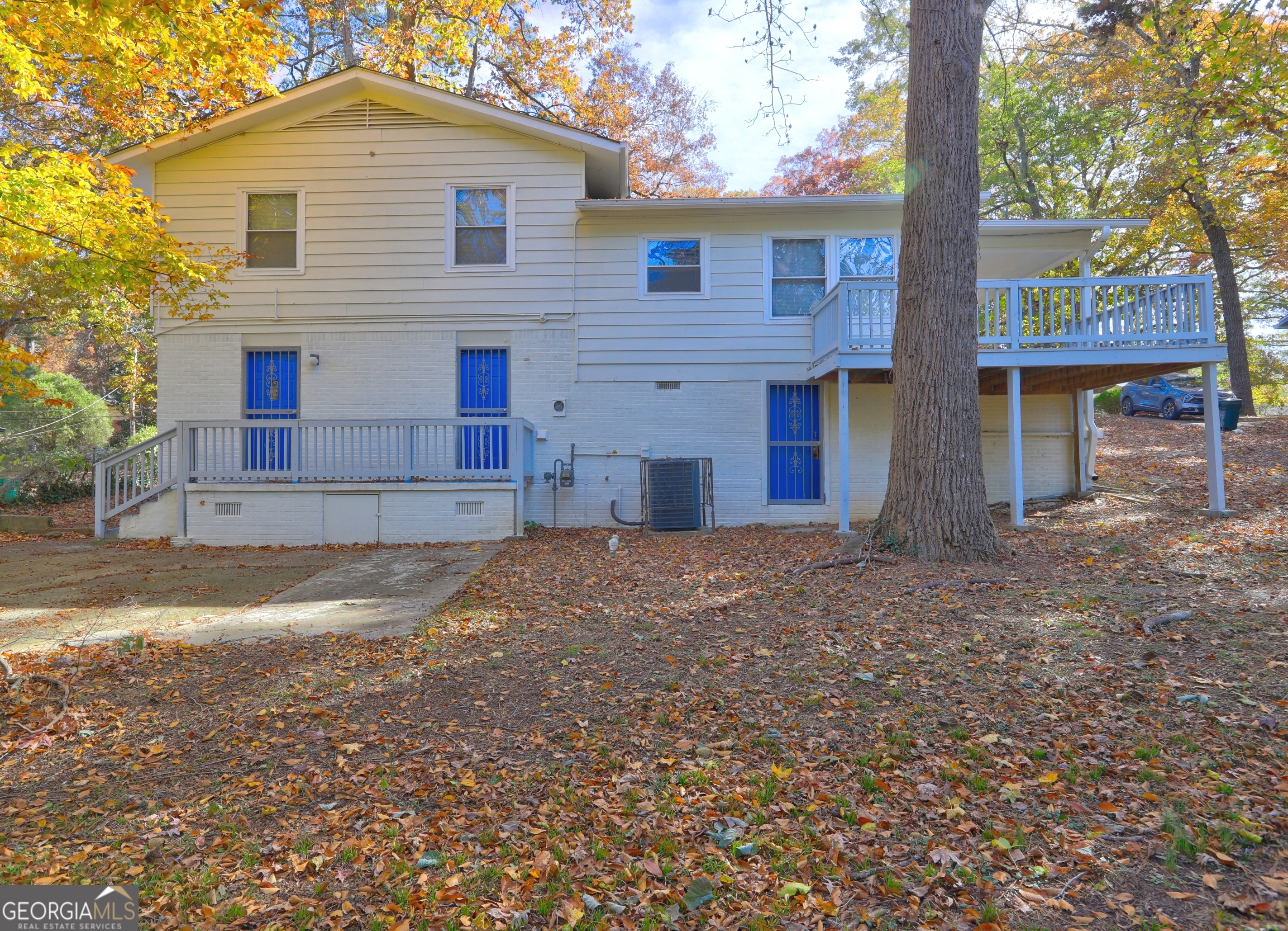 2270 Cresta Drive Decatur, GA 30032 - Photo 25 of 26 a front view of a house with a yard and garage