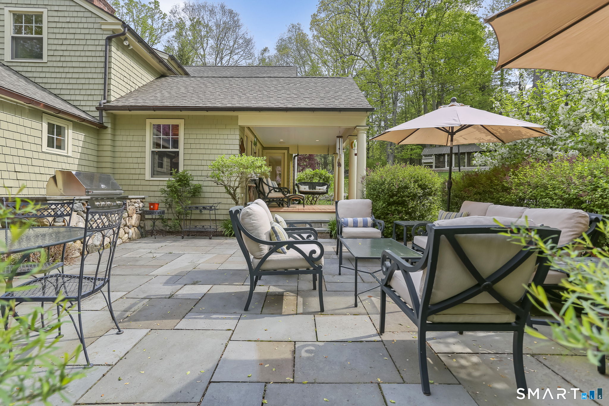 23 Old Stage Coach Road Weston, CT 06883 - Photo 32 of 37 Patio off of back porch with built-in grill