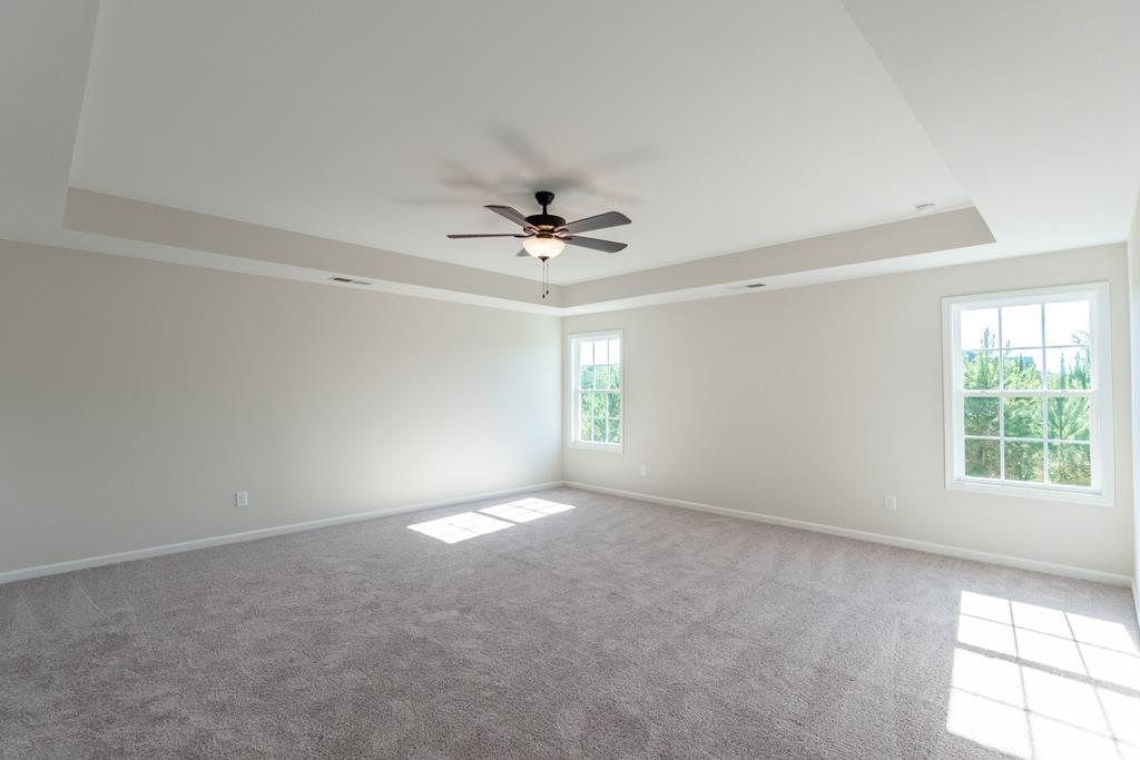 42 Hawkeye Trail Fortson, GA 31808 - Photo 19 of 29 a view of a livingroom with a ceiling fan and window