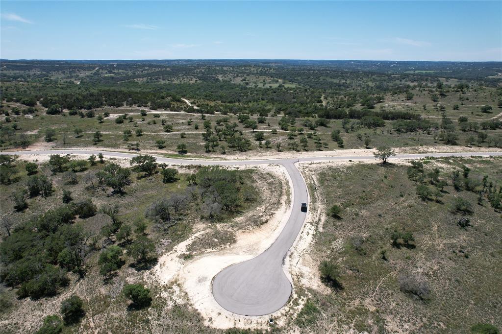 Tbd Tbd Winn Ranch Way Kerrville, TX 78028 - Photo 27 of 40 an aerial view of a house with a yard and lake view