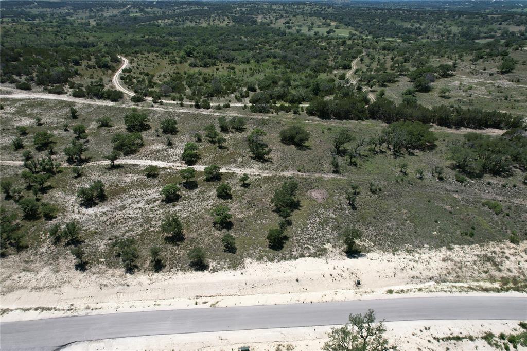 Tbd Tbd Winn Ranch Way Kerrville, TX 78028 - Photo 29 of 40 a view of a yard covered in snow