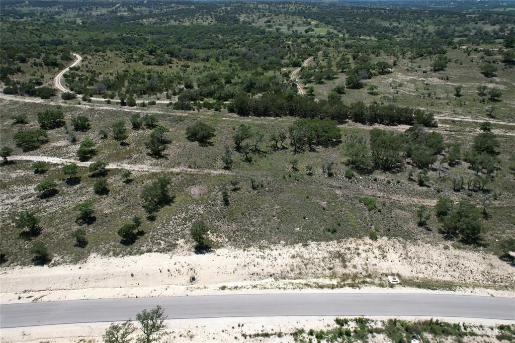 Tbd Tbd Winn Ranch Way Kerrville, TX 78028 - Photo 30 of 40 a view of a yard with a tree