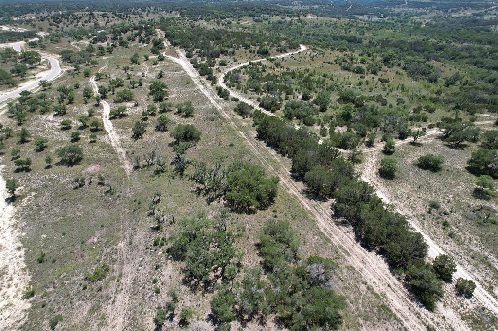 Tbd Tbd Winn Ranch Way Kerrville, TX 78028 - Photo 34 of 40 a view of a forest with a street