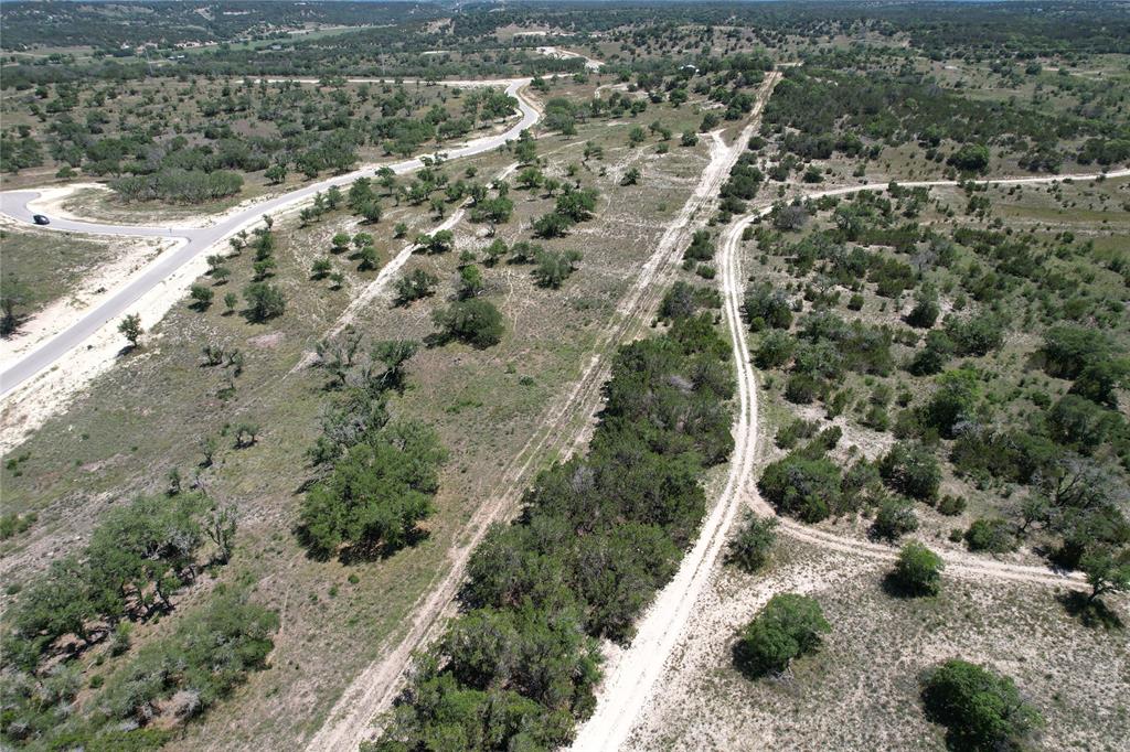 Tbd Tbd Winn Ranch Way Kerrville, TX 78028 - Photo 36 of 40 a view of a forest with a lake