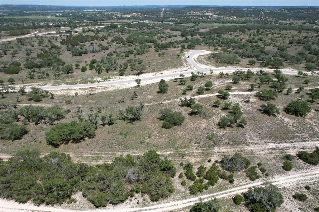 Tbd Tbd Winn Ranch Way Kerrville, TX 78028 - Photo 39 of 40 an aerial view of house with yard and mountain view in back