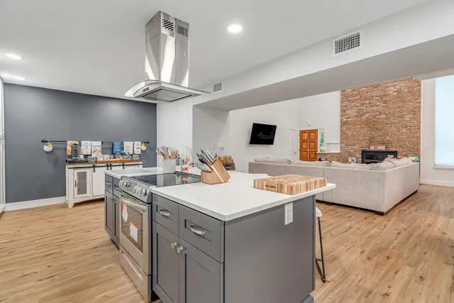 a bathroom with a sink and mirror
