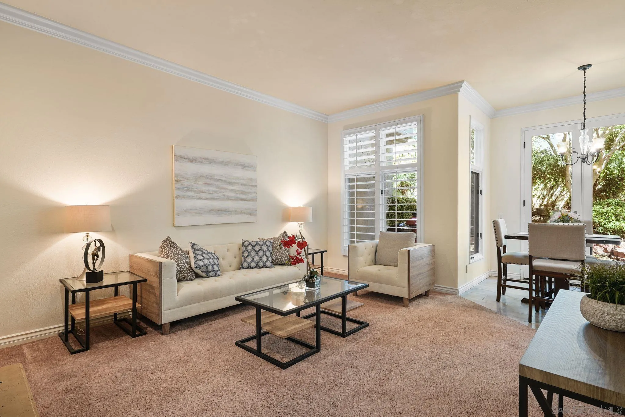 9683 Claiborne Square La Jolla, CA 92037 - Photo 15 of 67 a living room with furniture and a large window