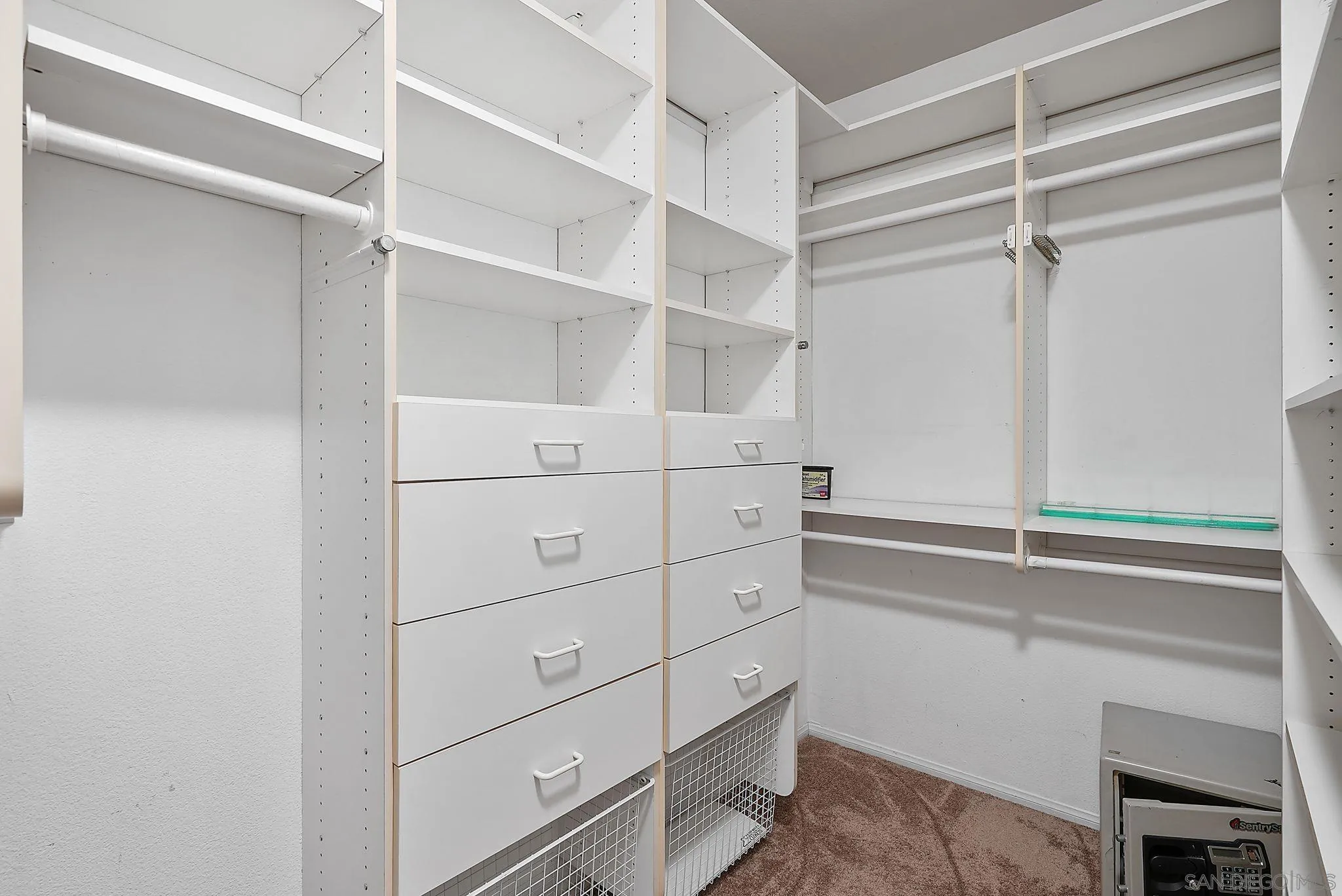 9683 Claiborne Square La Jolla, CA 92037 - Photo 40 of 67 a view of an empty walk in closet