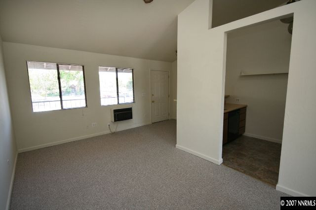 490 Highland Avenue, Unit 30 Reno, NV 89512 - Photo 3 of 6 an empty room with windows