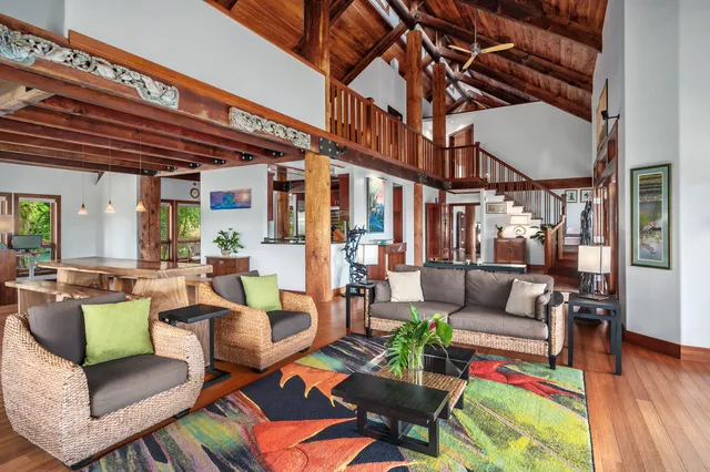 a lobby with furniture and floor to ceiling windows