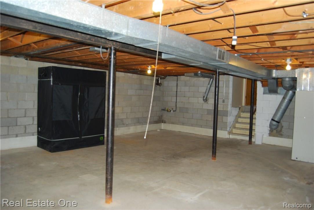 1296 North Adams Road Rochester, MI 48306 - Photo 17 of 23 PLENTY OF ROOM IN THE UNFINISHED BASEMENT