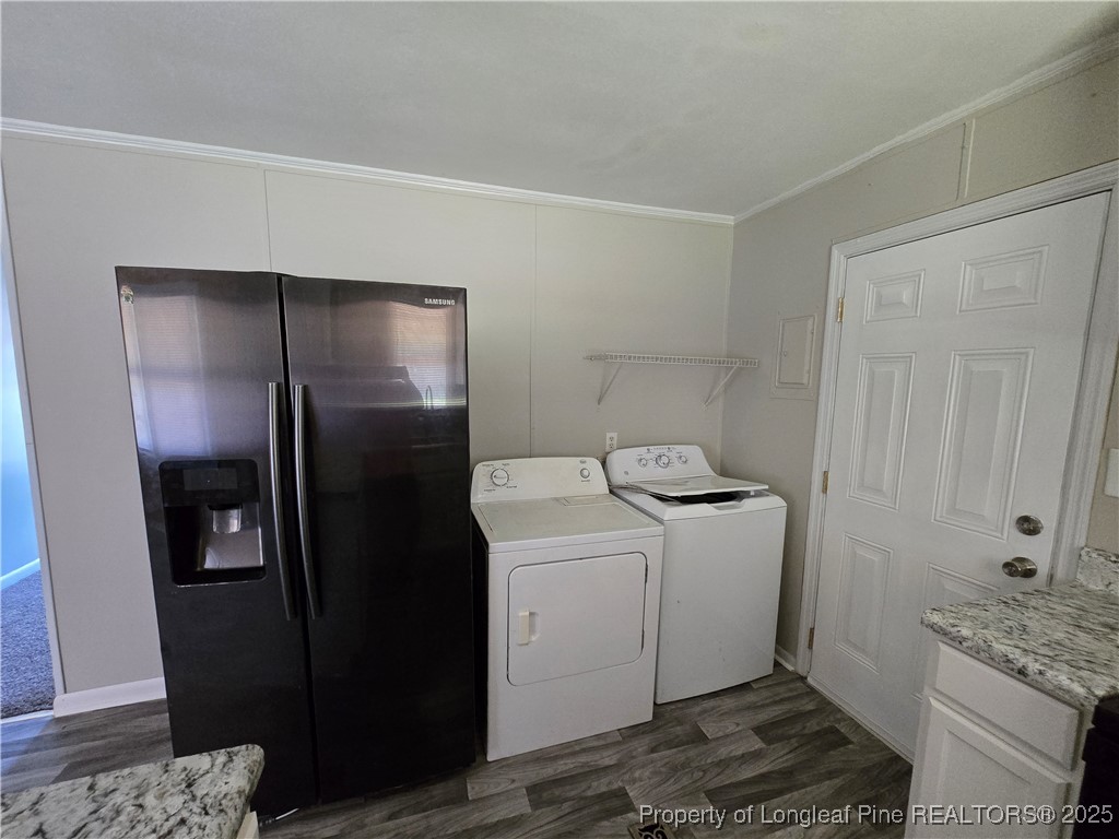 4617 Belford Road Fayetteville, NC 28314 - Photo 7 of 21 a utility room with cabinets washer and dryer