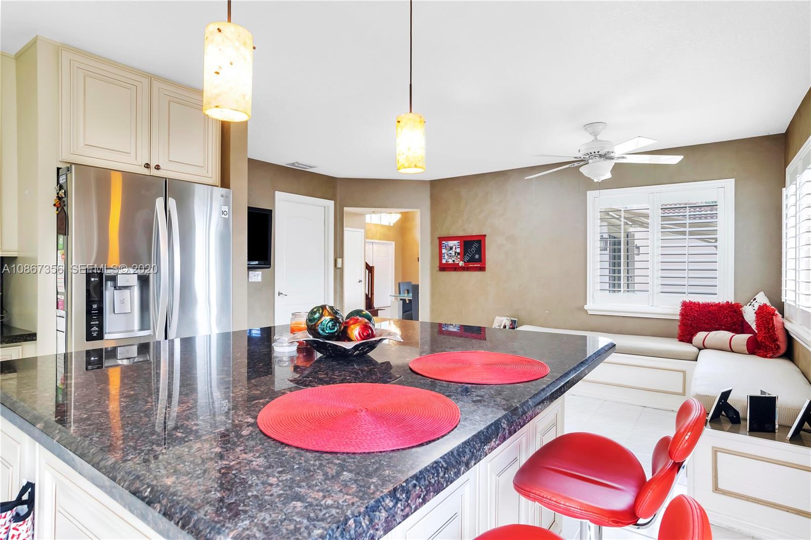 11360 Rockinghorse Road Cooper City, FL 33026 - Photo 14 of 31 a view of a dining room with furniture