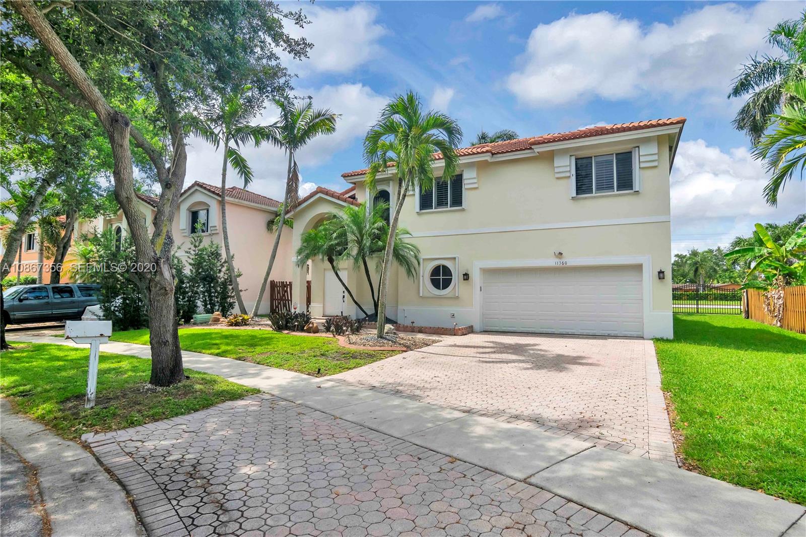 11360 Rockinghorse Road Cooper City, FL 33026 - Photo 2 of 31 a house with a outdoor space