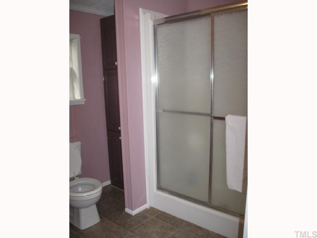 533 Powhatan Road Clayton, NC 27527 - Photo 9 of 12 Shower and toilet have their own separate room within the Master BA.