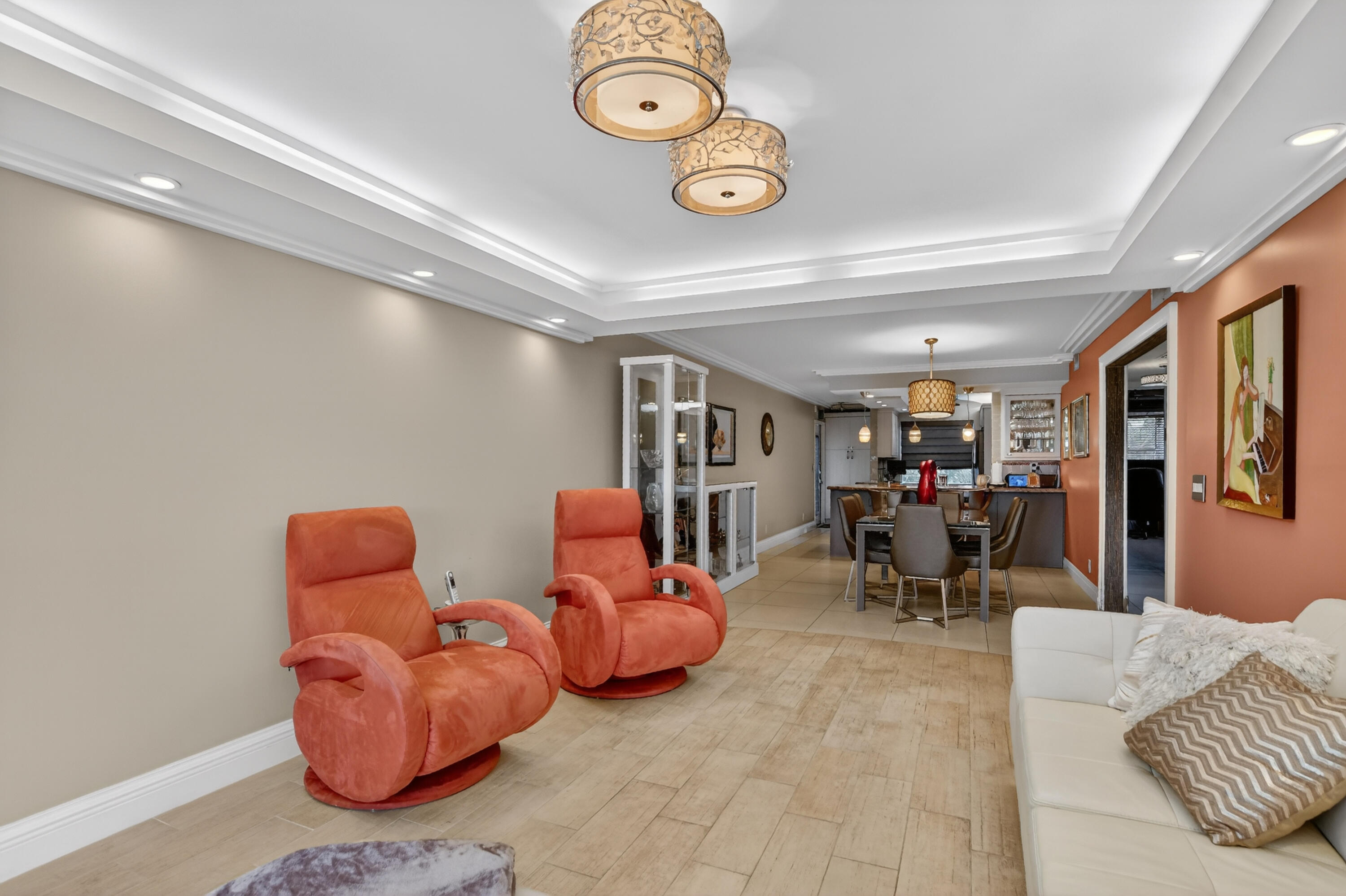 3080 Yarmouth C Boca Raton, FL 33434 - Photo 13 of 83 a living room with furniture a clock and a window