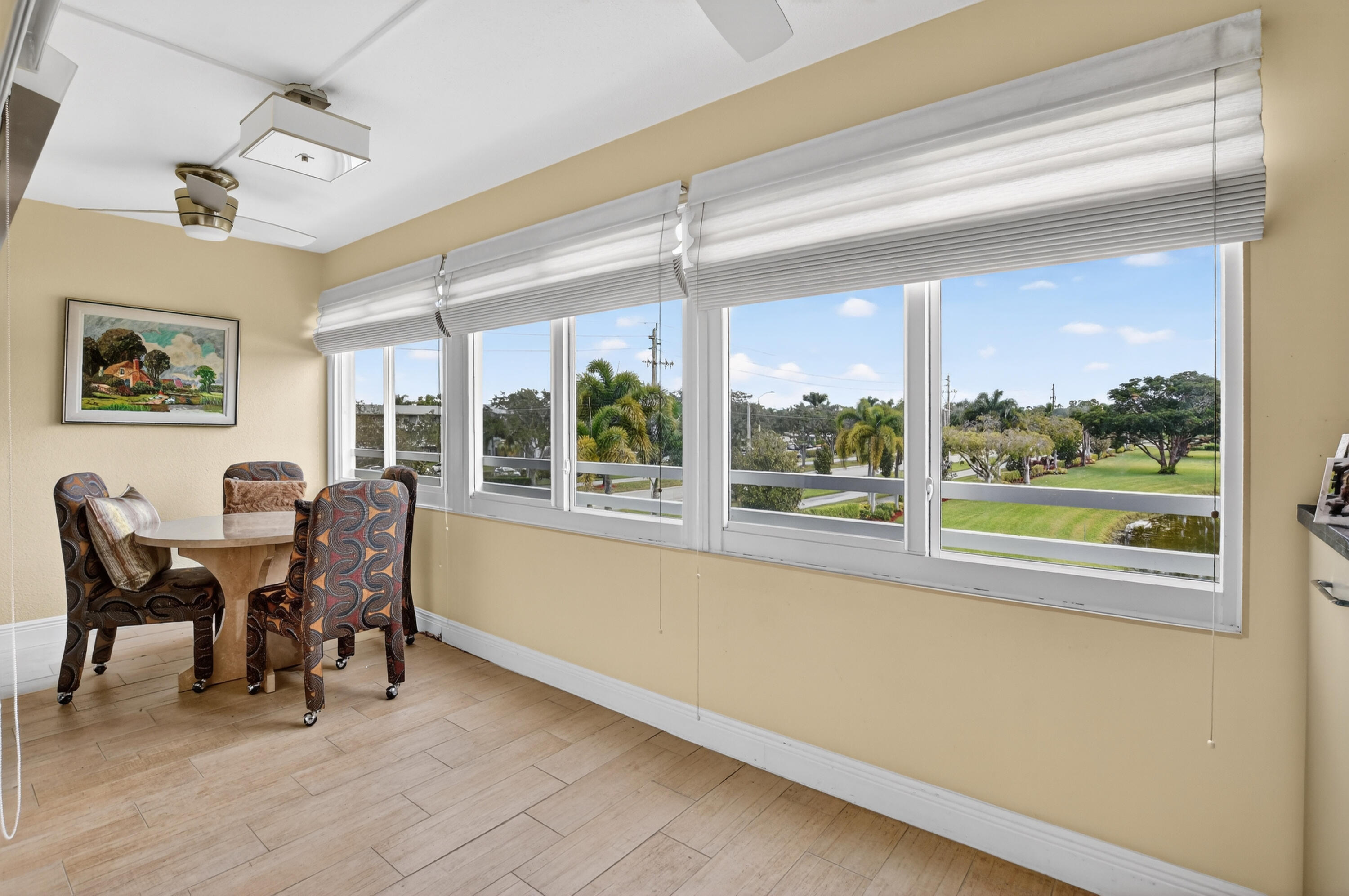 3080 Yarmouth C Boca Raton, FL 33434 - Photo 14 of 83 a view of a dining room with furniture window and outside view