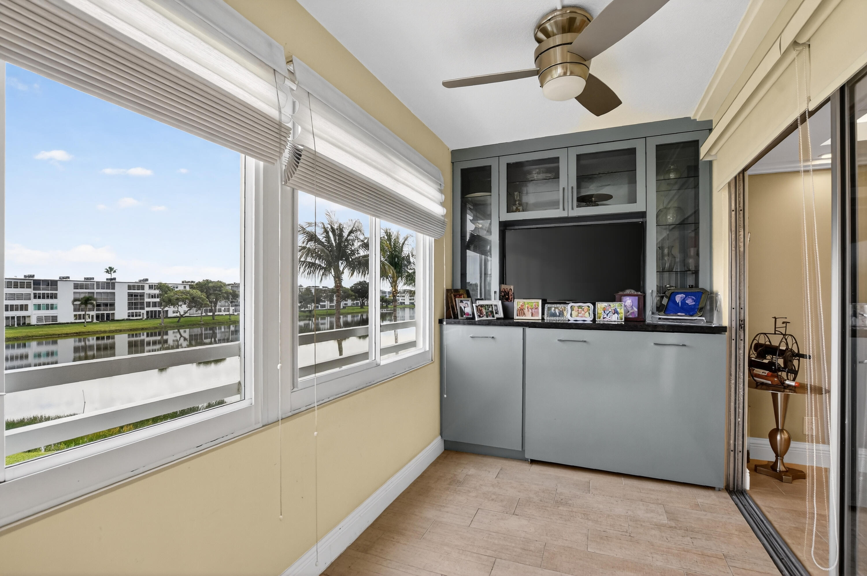 3080 Yarmouth C Boca Raton, FL 33434 - Photo 16 of 83 a living room with furniture and a flat screen tv