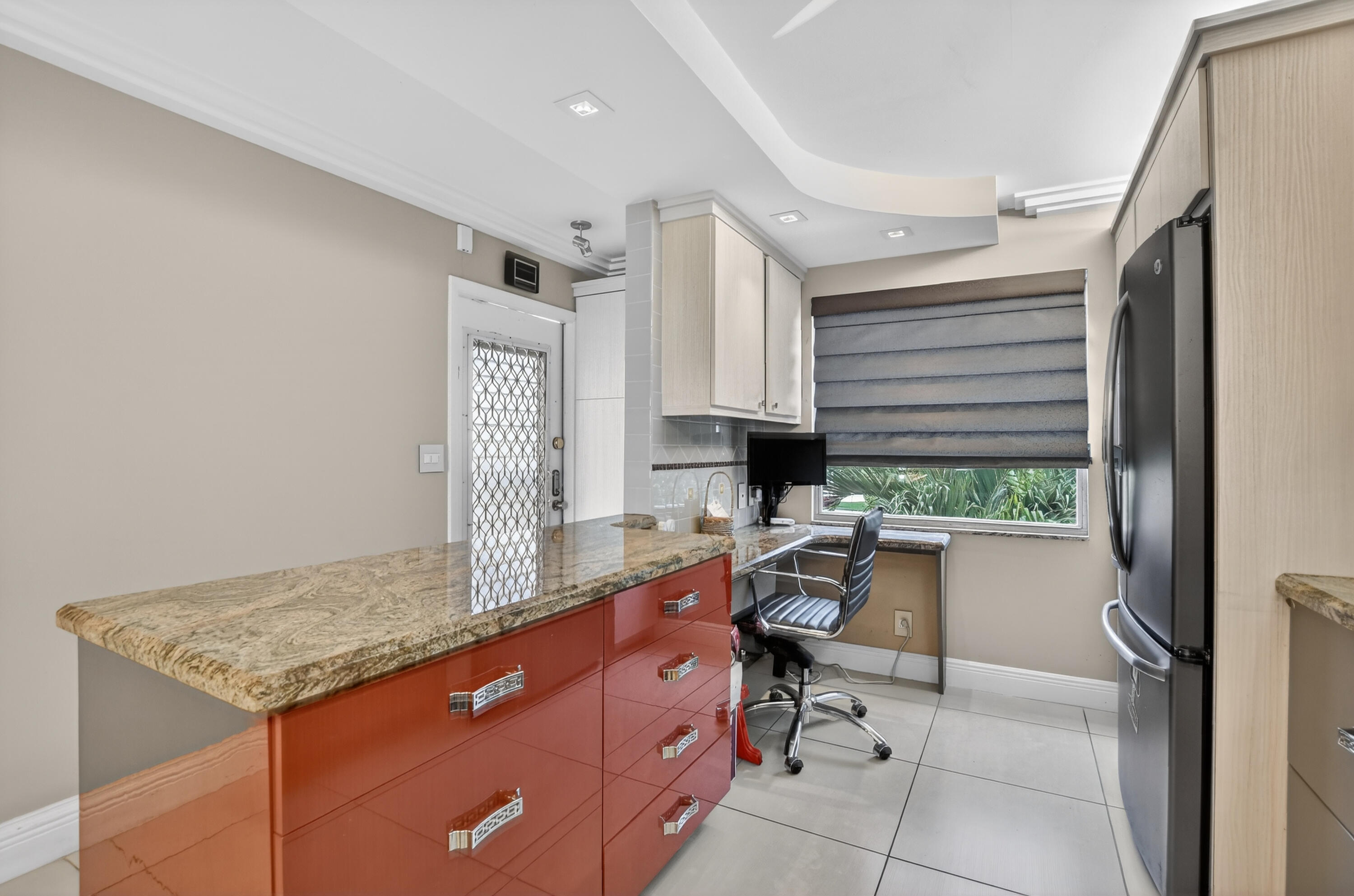 3080 Yarmouth C Boca Raton, FL 33434 - Photo 2 of 83 a room with a table chairs and a window