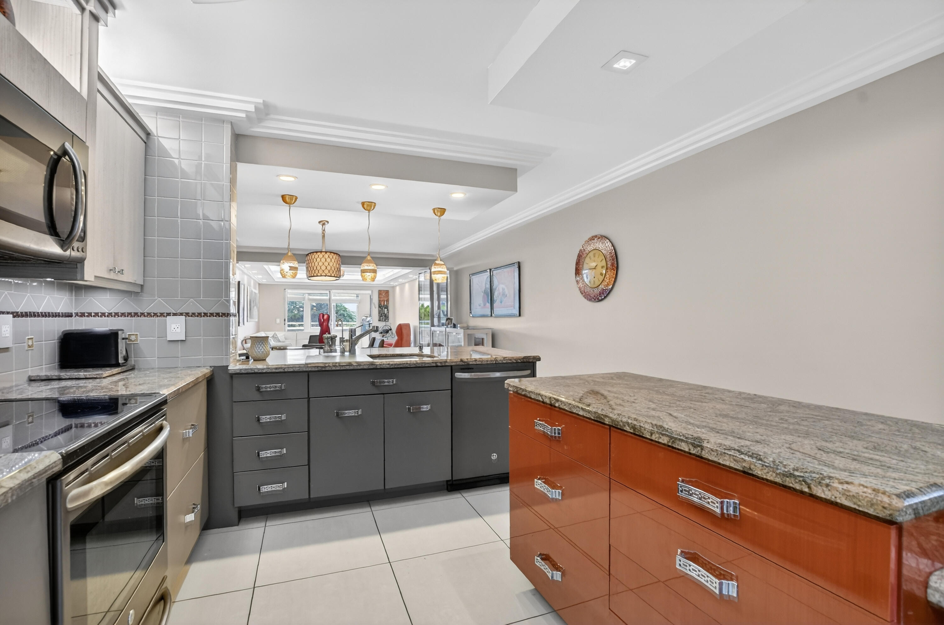 3080 Yarmouth C Boca Raton, FL 33434 - Photo 3 of 83 a kitchen with granite countertop a sink stainless steel appliances and cabinets