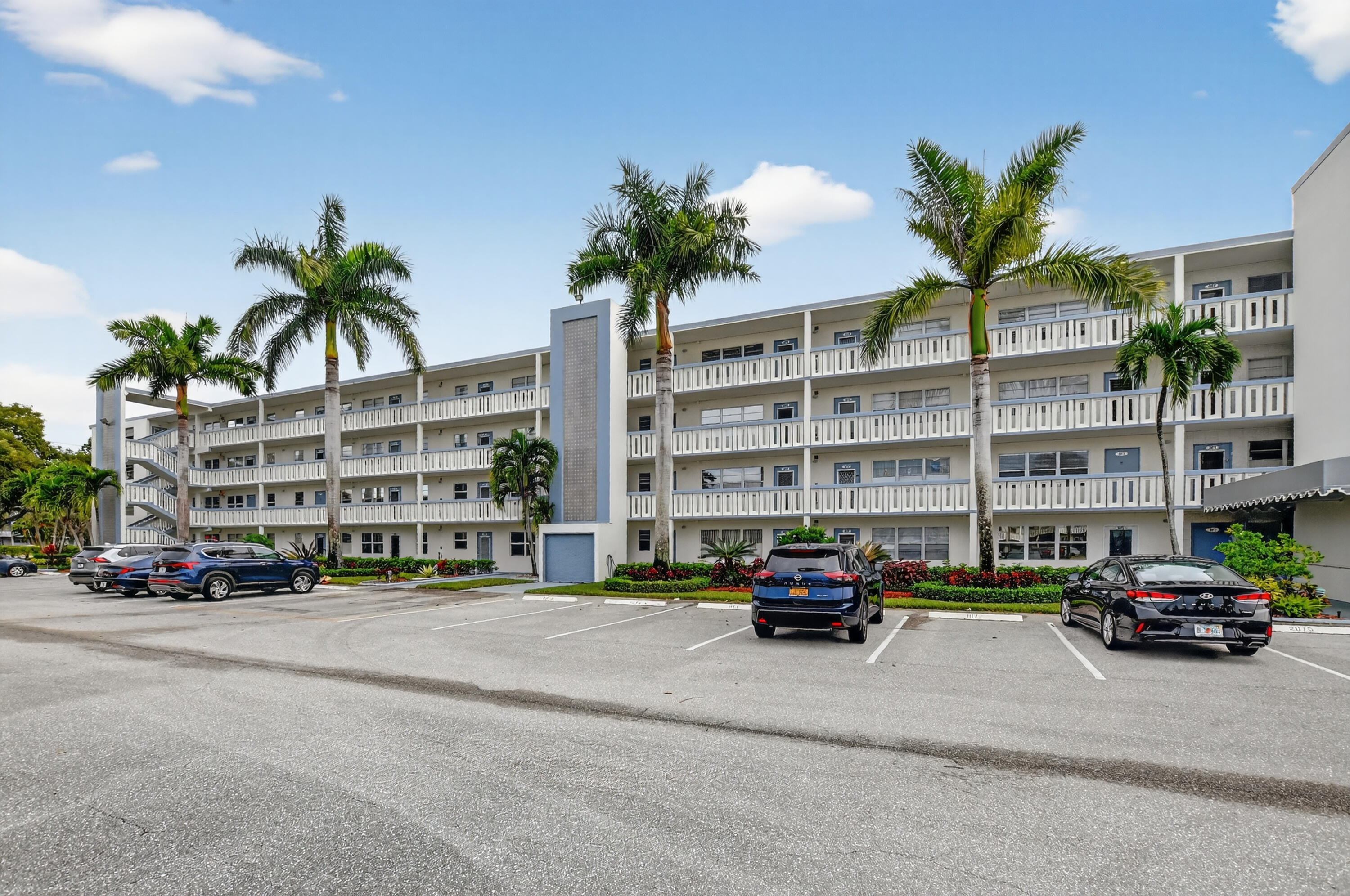 3080 Yarmouth C Boca Raton, FL 33434 - Photo 31 of 83 a cars parked in front of a building