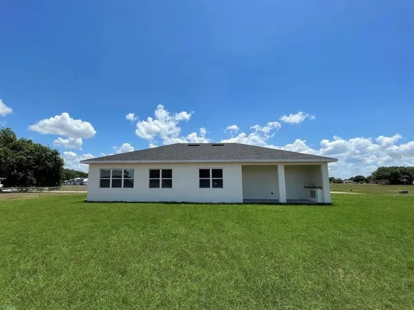 a house view with a garden space