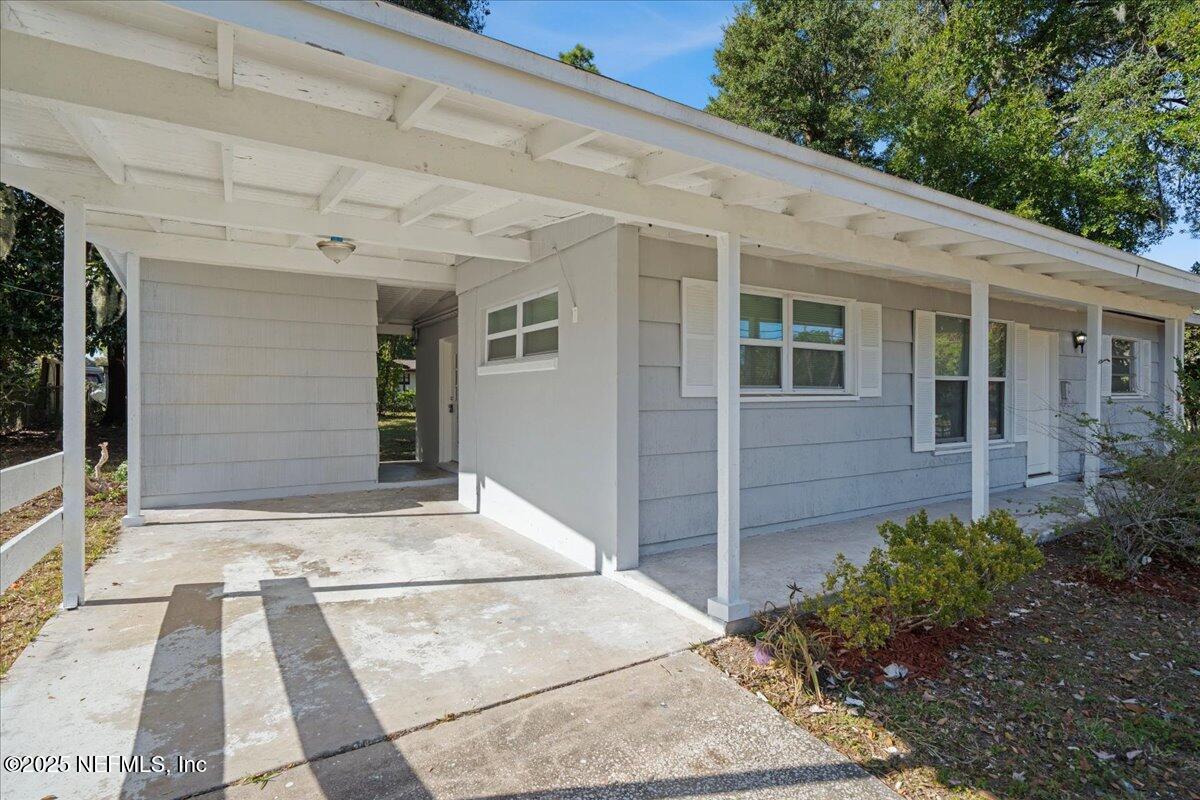 2142 Fouraker Road Jacksonville, FL 32210 - Photo 4 of 29 a view of house with backyard
