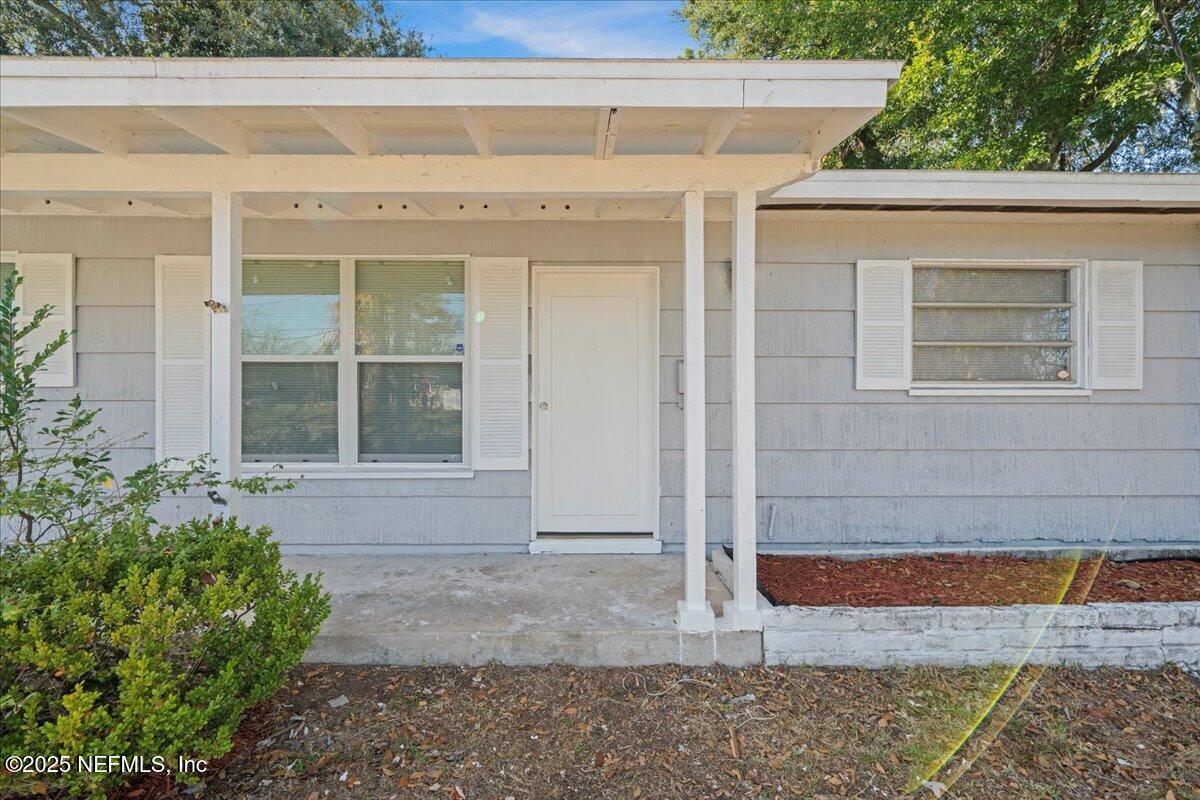 2142 Fouraker Road Jacksonville, FL 32210 - Photo 6 of 29 a front view of a house