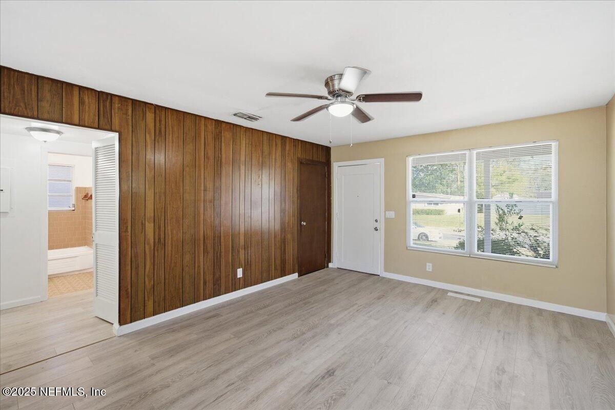2142 Fouraker Road Jacksonville, FL 32210 - Photo 7 of 29 a view of an empty room with a window
